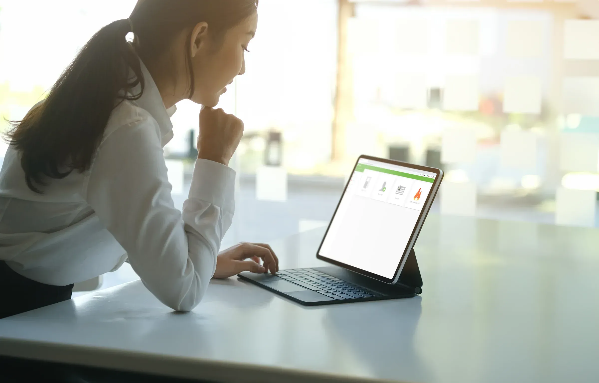 A person managing door access in Paxton Net2 on a laptop