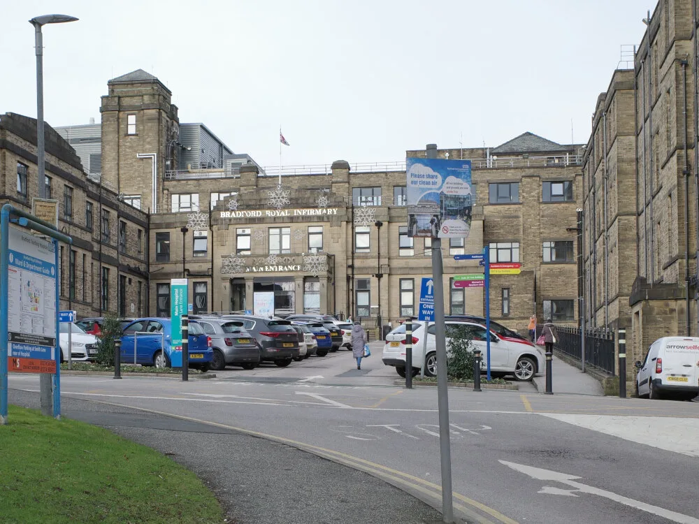 The stone main entrance of Bradford Royal Infirmary on Duckworth Lane